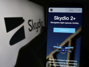 Stuttgart, Germany, 04-13-2024: Person holding cellphone with webpage of US drone manufacturing