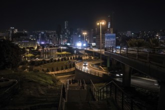Cars drive at night on the Beirut Central Ring Road, one of the most important transport links in