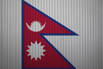 Nepal Flag painted on the cracked grunge concrete wall