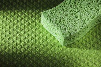 New kitchen sponge on dishcloth