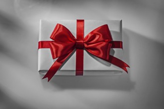 White Paper Covered Vintage Gift Box With Red Ribbon Bow