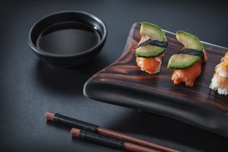 Sushi Ama Ebi Nigiri On Wooden Board With Soy And Chopstick