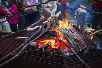 Stick bread over a campfire