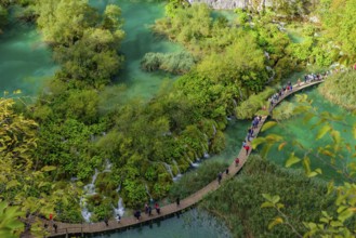 People walking on the trekking path at Plitvice Lakes National Park (Plitvi?ka Jezera), a national