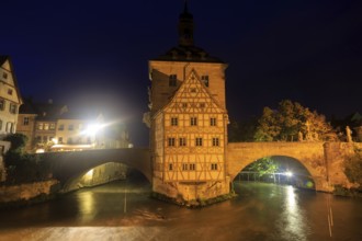 Obere bridge (brücke) and Altes Rathaus at night in Bamberg, GermanyObere bridge and Altes Rathaus