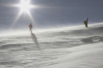 Skiers in snowstorm