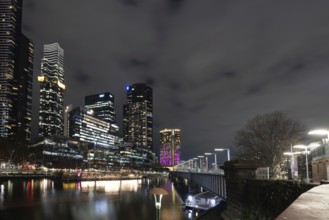 MELBOURNE, AUSTRALIA - JULY 5, 2024: Melbourne skyline as seen at dusk from Sandridge Bridge near