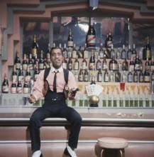 Sammy Davis Jr. 1925-1990. American singer, musician, dancer, actor. Pictured here when recording a