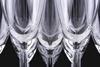 Champagne glasses in a black background
