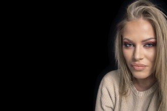 Sensual beautiful blonde woman, beautiful blue-eyed woman. Professional Make-up