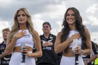 The CELSIUS Girls stand for the national anthem and prayer for the Tennessee Lottery 250 in