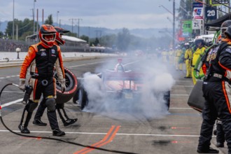 INDYCAR Series driver, BENJAMIN PEDERSEN (R) (55) of Copenhagen, Denmark, brings his car in for