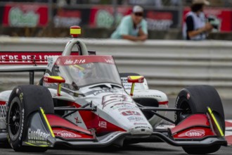 INDYCAR Series driver, STING RAY ROBB (R) (51) of Payette, Idaho, races through the turns during