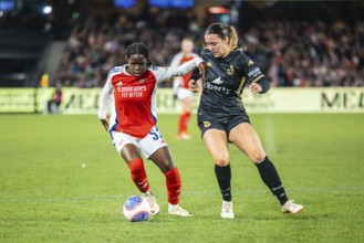 MELBOURNE, AUSTRALIA, MAY 24: Vivienne Lia of Arsenal Women FC competes against Michaela Foster of