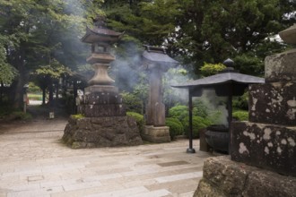 Cloud of smoke, incense sticks, Ryushaku-ji, Buddist Temple, Yamadera, Japan