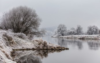 Landscape with River Weser near Wesertal in winter, district of Kassel, Hesse, Germany