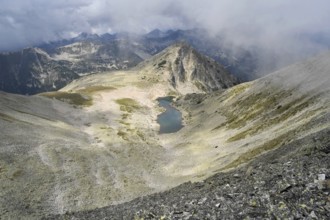 Gazei Lake and the peak of the same name dominate a wild valley in Pirin National Park, Bulgaria
