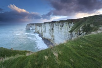 Sunrise over Atlantic ocean rocky coast, Etretat, Normandy, France