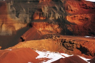 Martian landscapes in Iceland. The red crater of The Seydisholar volcano. The quarry of red soil