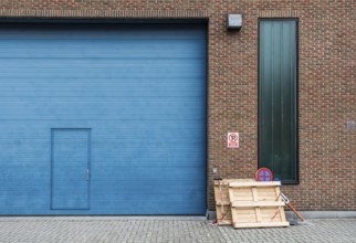 Jette, Brussels Capital Region, Belgium, 12 20 2019 Ugly blue Industrial garage port