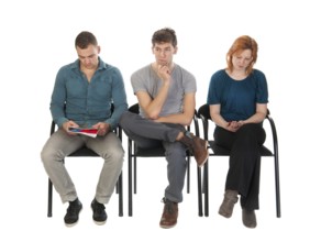 Young people are waiting in a room