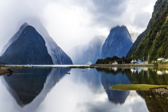 Land of hobbits - New Zealand. Port of tourist and pleasure ships, yachts and boats. Storm clouds