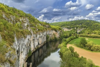 Landscape with rocky shore of Lot river, France