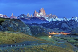 Early morning in the village of El-Chalten. Mountain peak in Patagonia. The grand crimson dawn over