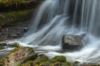 Fresh water waterfall on rocks moss cover in mountain. Fresh water waterfall on rocks moss cover in