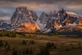 Snowy Alpe di Siusi, Seiser Alm, Sassolungo a Sassoplatto at sunset