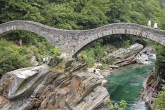 Stone arches of the ancient Roman bridge Ponte dei Salti, Val Verzasca, Switzerland, 17 July 2008