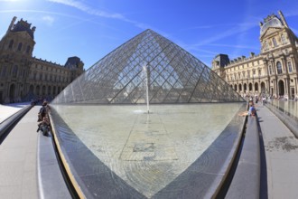 Paris, September 8: The world-famous entrance to the Louvre - the glass pyramid and a spectacular