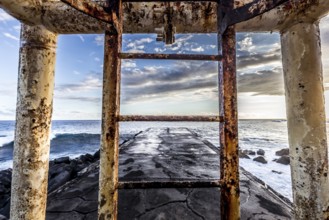 Jetty and lighthouse in Saint Pierre, La Reunion island, Indian Ocean, april 26, 2016, Saint