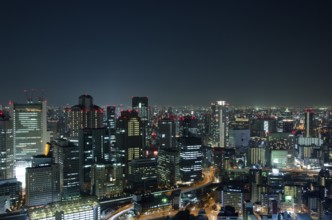 Skyline of Osaka City in Japan at night with lots of lights, Osaka, Japan