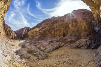 Picturesque and multi-color Black canyon in ancient Eilat mountains. Israeli warm winter. Photo