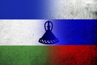 National flag of Russian Federation with The Kingdom of Lesotho National flag. Grunge background