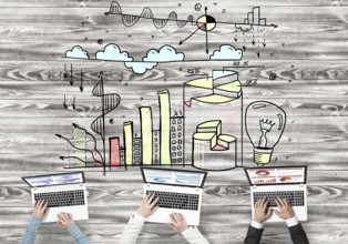 Group of people with devices in hands working together as symbol of networking and communication