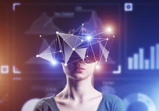 Young attractive woman in VR glasses. Immersion in the virtual world