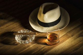 Cigar, rum and Panama hat