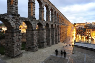 Roman aqueduct in the evening, historic city centre, UNESCO World Heritage Site, Segovia,