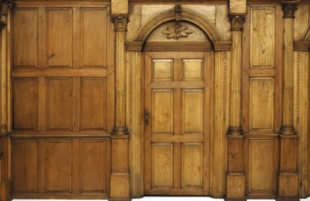 Wooden paneled wall and an arched door Victorian architecture style interior