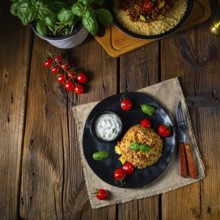 Rustic wulgur fried with minced meat and vegetables