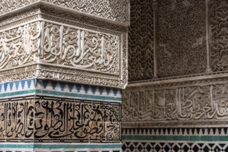 Fes, Morocco, April 04, 2023, Rich decorated facade in the courtyard of the Medersa Attarine in