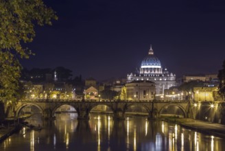 View of Ponte Vittorio Emanuele II and St. Peter's Basilica in evening, Rome