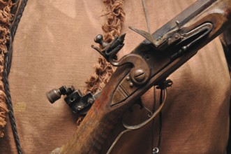 Mechanism of a blackpowder flintlock rifle