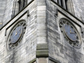 The tower of church of saint johns in leeds a seventeenth century church showing two old clocks