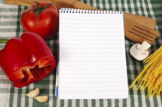Notebook to write recipes and vegetables around it