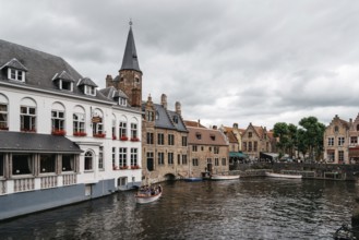 Bruges, Belgium, July 29, 2016: Canal scene in the city of Bruges. The historic city centre is a