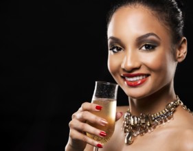 Romantic Indian woman with golden makeup and nailpolish. Big gold fashion necklace. Black isolated