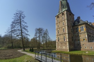 Historic castle with high tower, small bridges and water channels, raesfeld, münsterland, germany